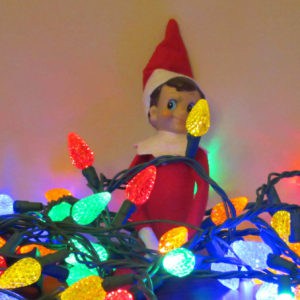 elf on the shelf with Christmas lights 
