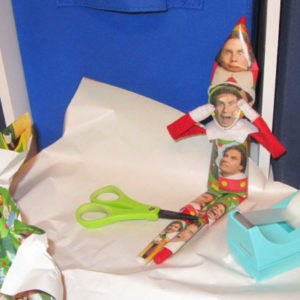 elf on the shelf with wrapping paper 