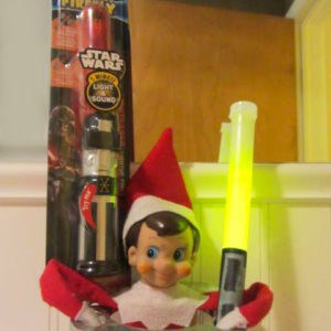 elf on the shelf with light saber toothbrush