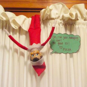 hanging around upside down elf on the shelf