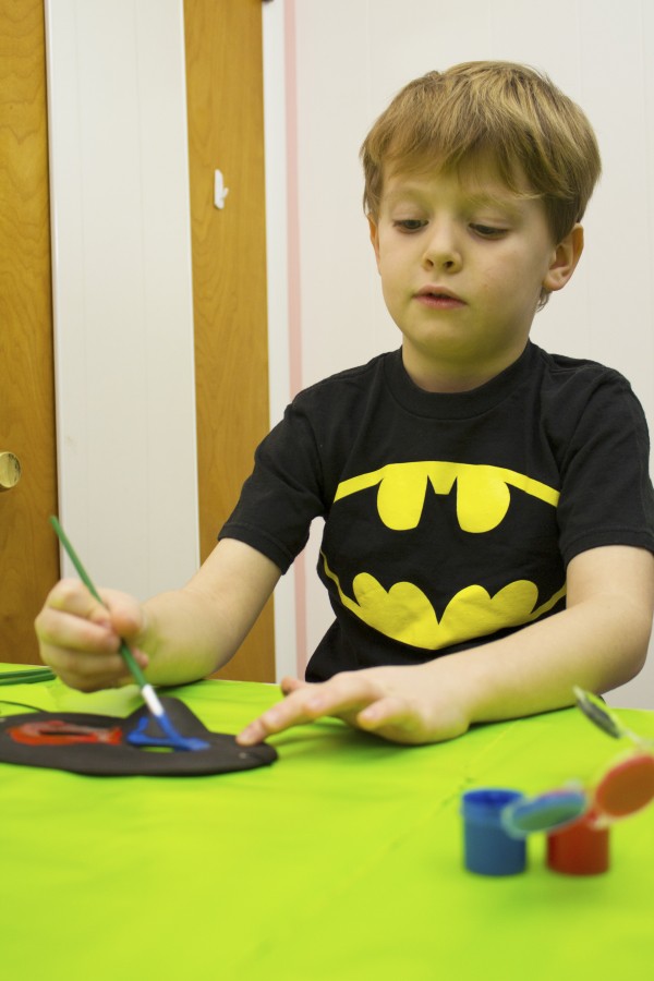 boy painting mask