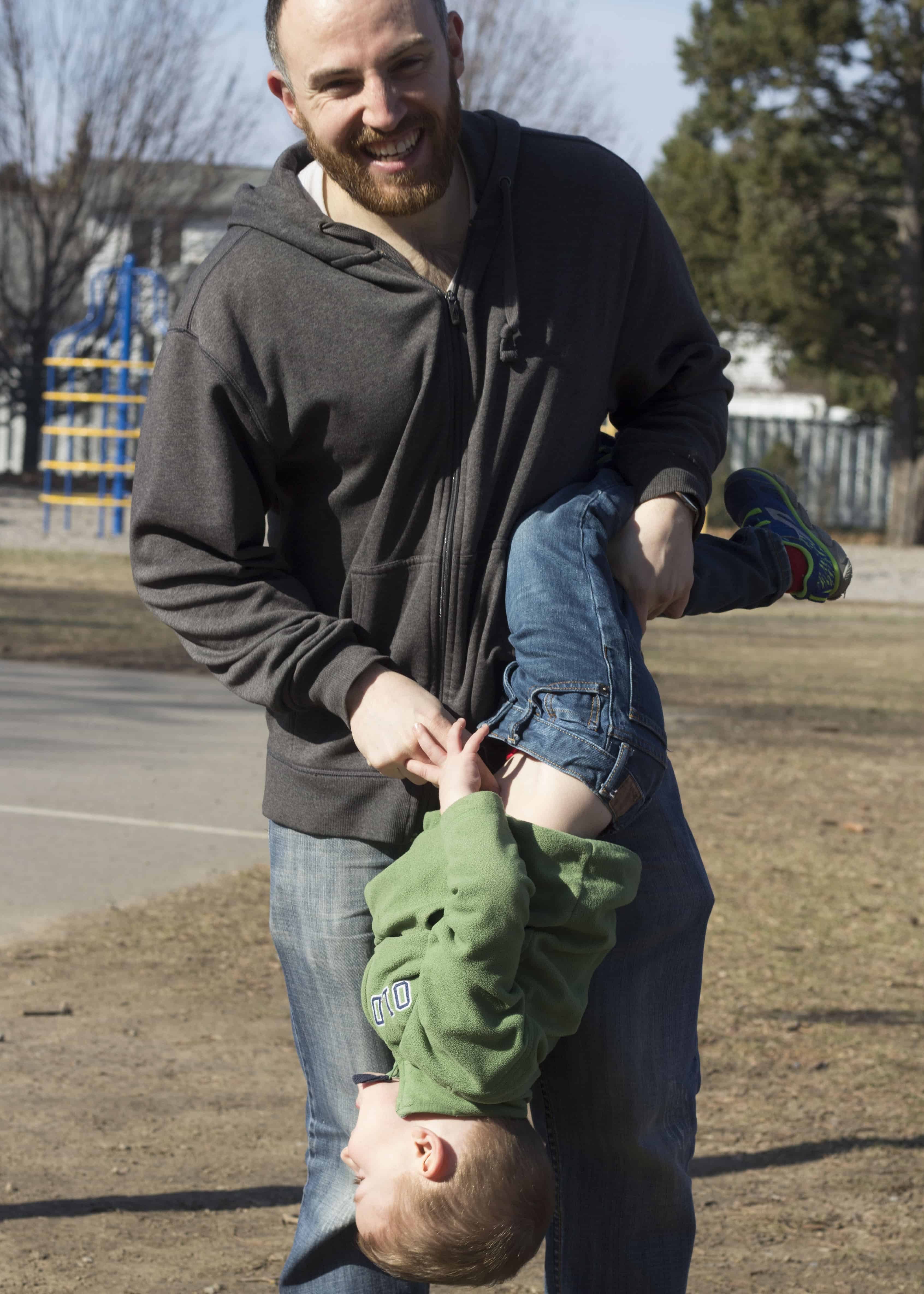 DAD PLAYING WITH SON