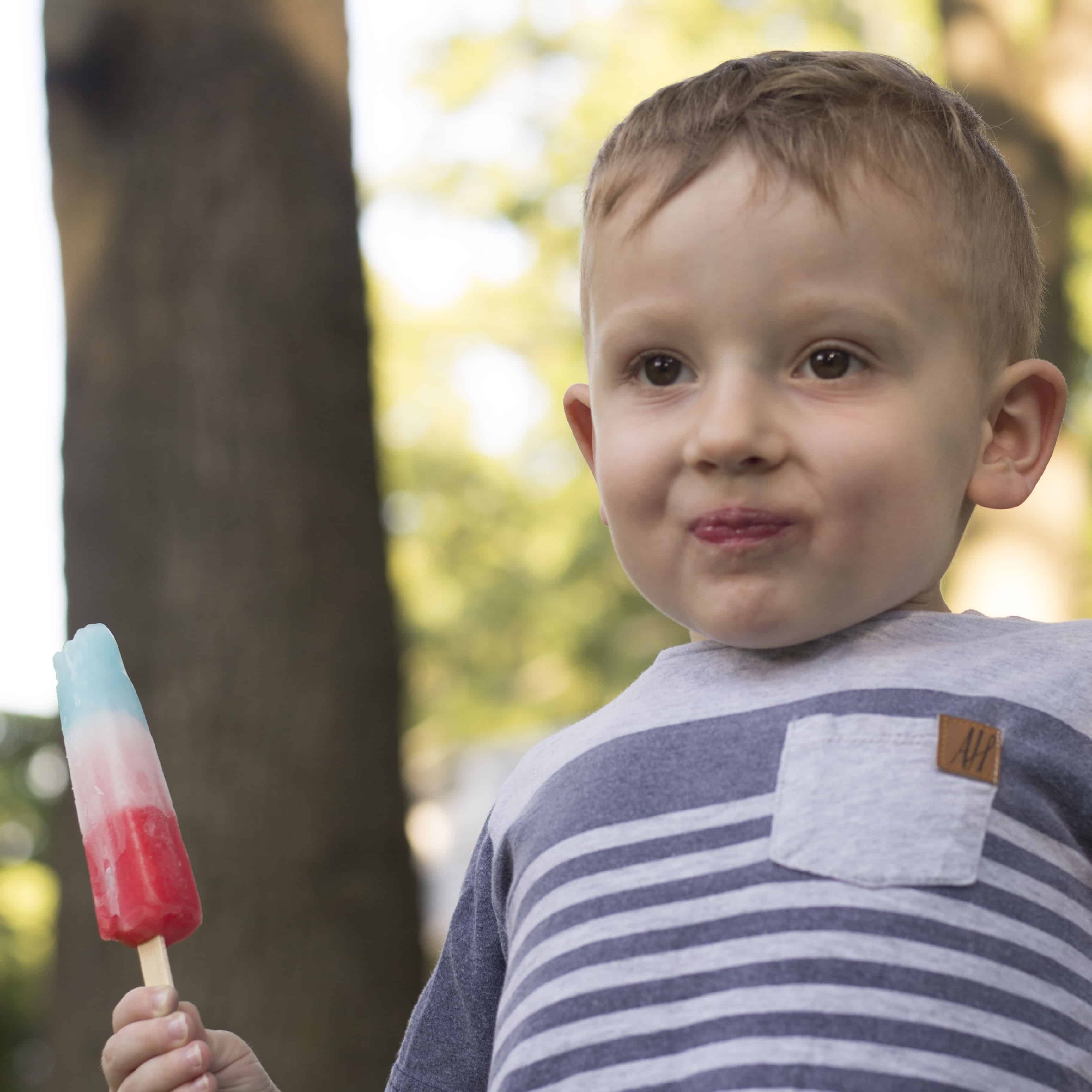 TODDLER WITH BOMB POP