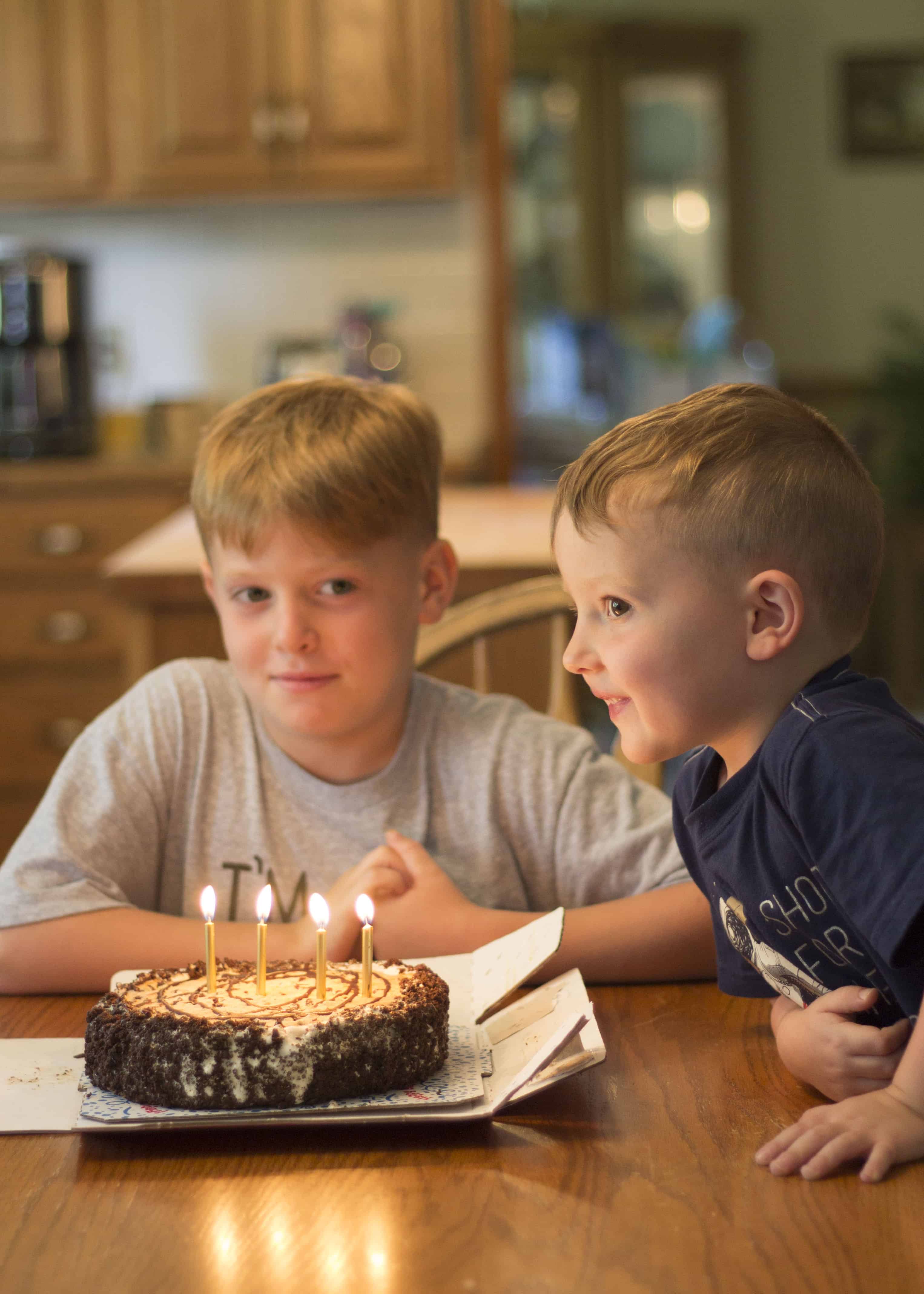 BROTHERS WITH BIRTHDAY CAKE