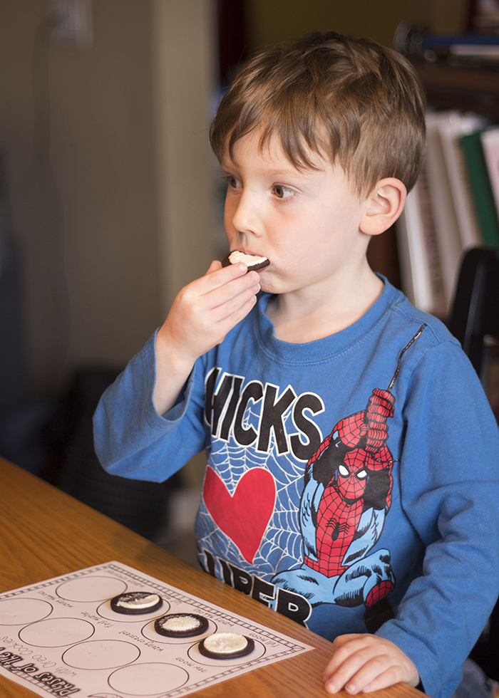 BOY EATING OREO