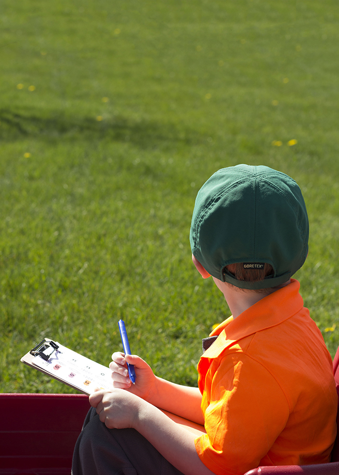 BOY LOOKING FOR FLOWERS