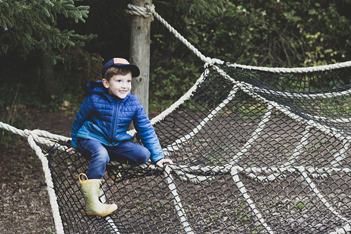 boy in spiderweb