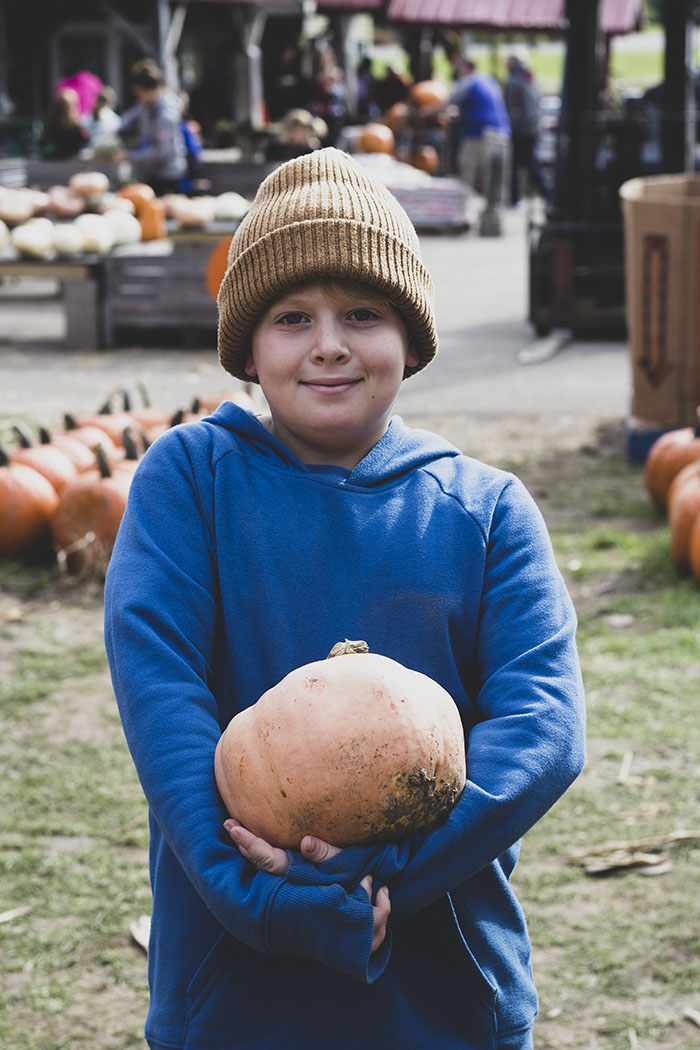 boy with pumpkin