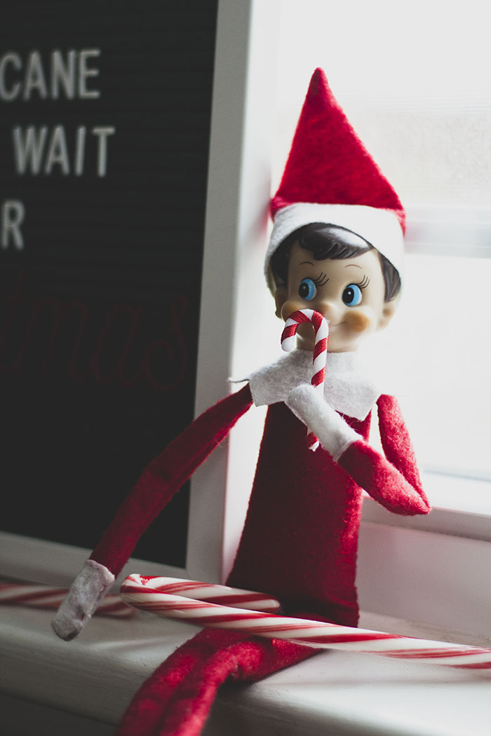 ELF ON THE SHELF WITH A CANDY CANE