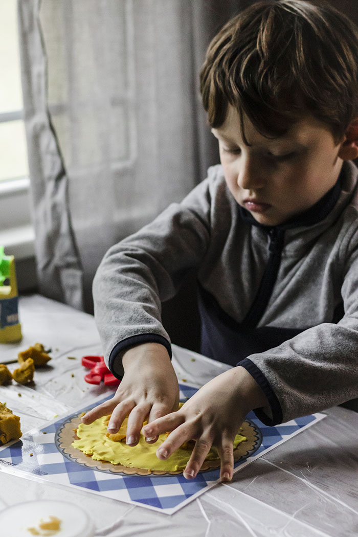 BOY MAKING PLAYDOH PIE