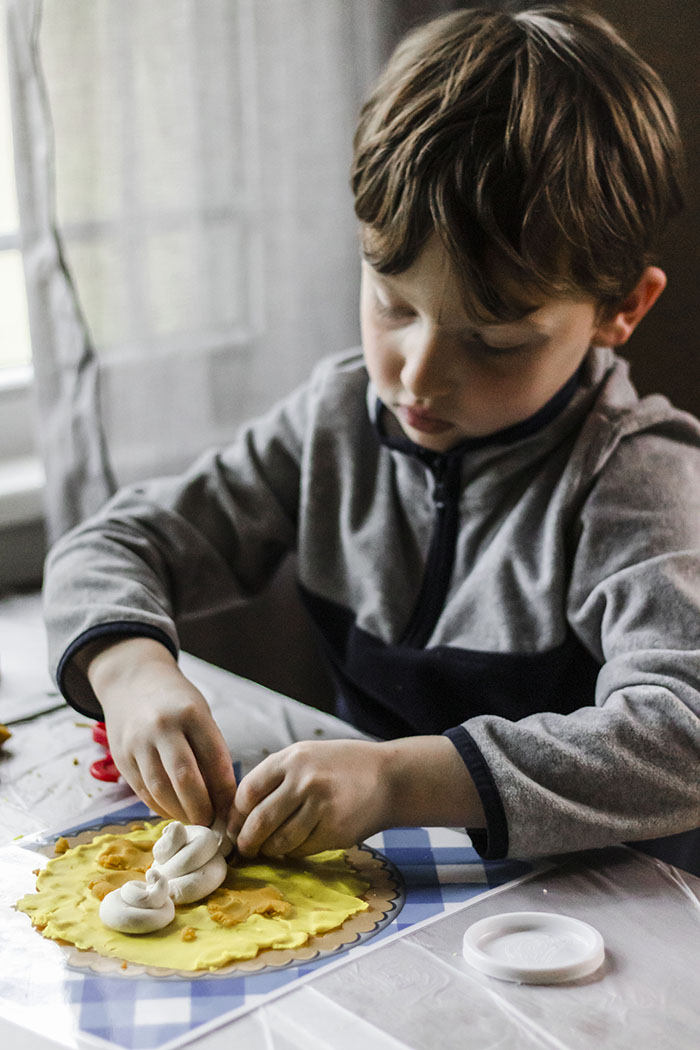 BOY WITH PLAYDOH PIE