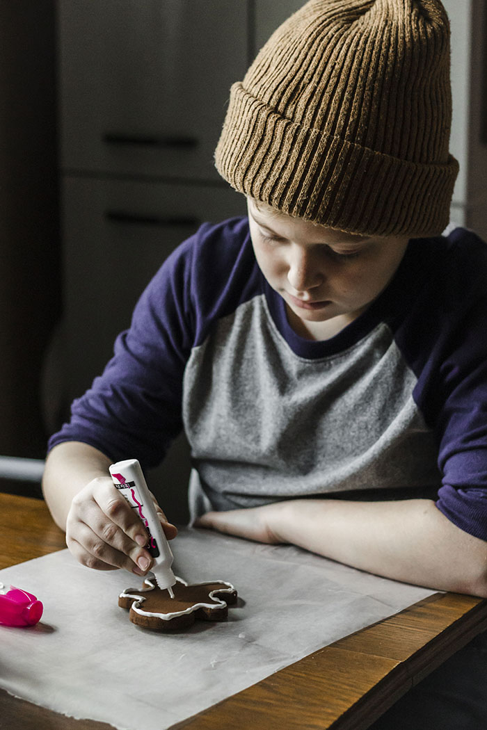 BOY PAINTING GINGERBEAD